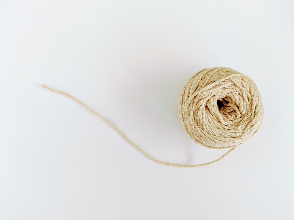 Using twine for our packaging [Photo by Adam Valstar on Unsplash]